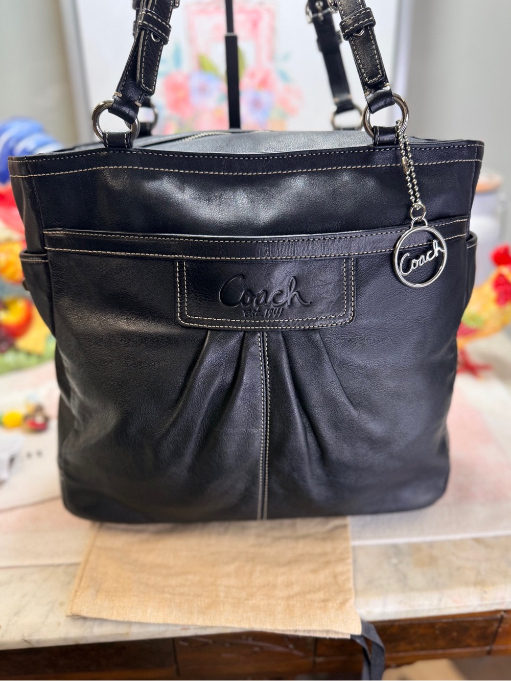 Coach Black Leather Shoulder Bag with Logo Charm